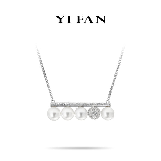 Spring Collection:Modern White Pearlsdetailed "5 dragon balls" necklace.