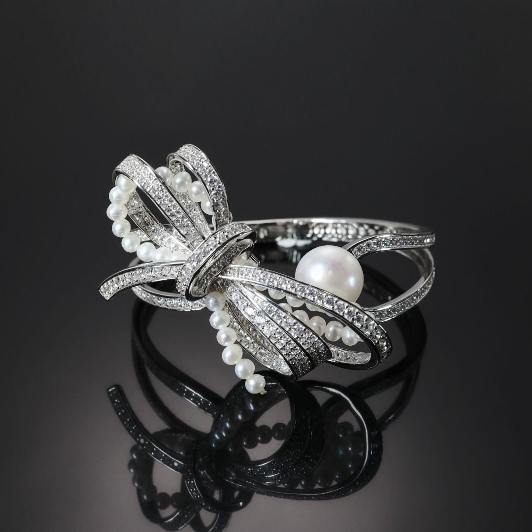 Special offer Micro-setting Lab created stones White pearl bowknot detailed bangle , sterling silver.