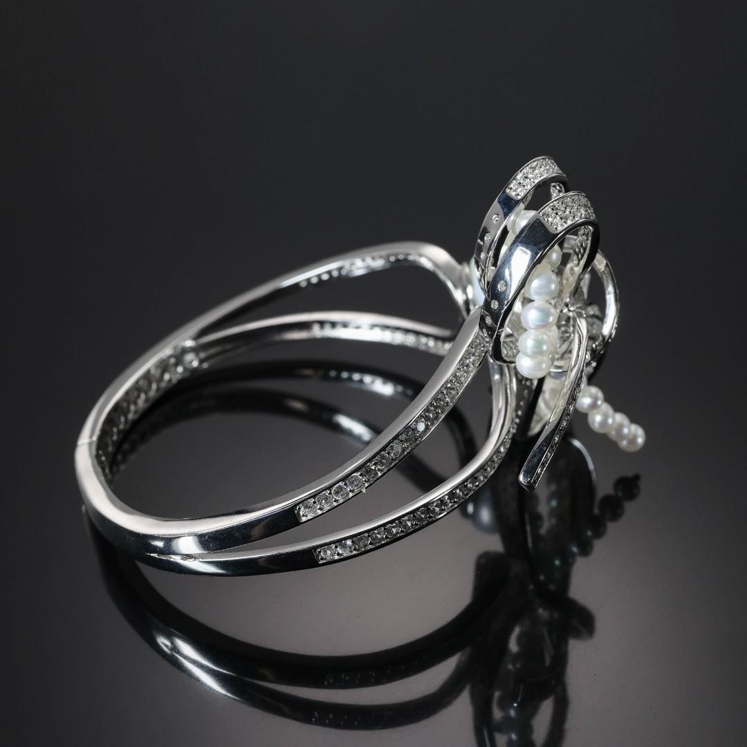 Special offer Micro-setting Lab created stones White pearl bowknot detailed bangle , sterling silver.