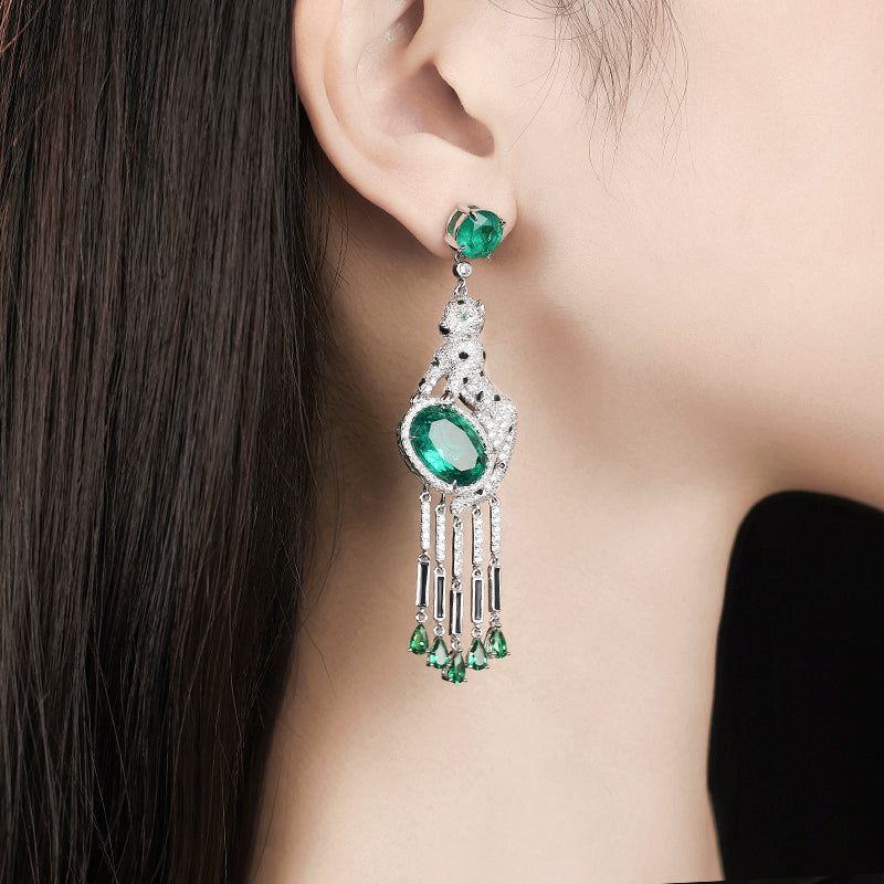 Jaguar selection, featuring stunning artificial emerald and black enamel tassel earrings. sterling silver