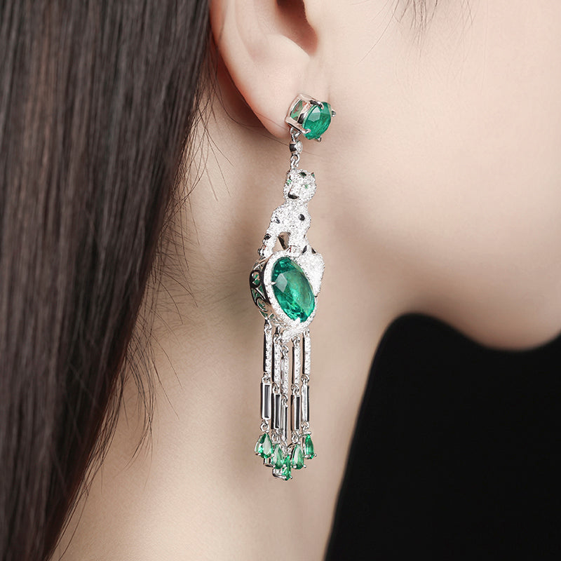 Jaguar selection, featuring stunning artificial emerald and black enamel tassel earrings. sterling silver