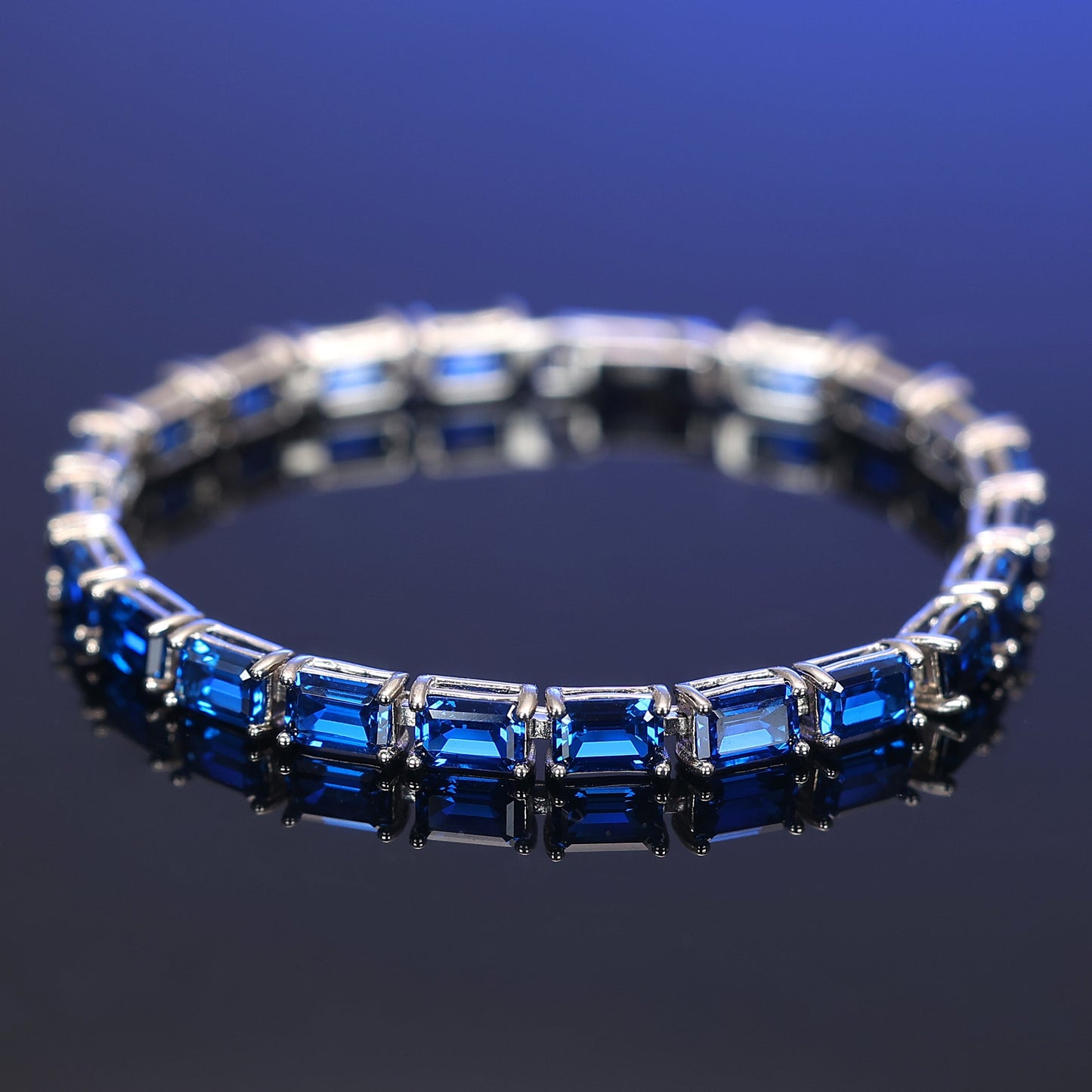 Micro-setting Sapphire color emerald cut Lab created stones bracelet, sterling silver