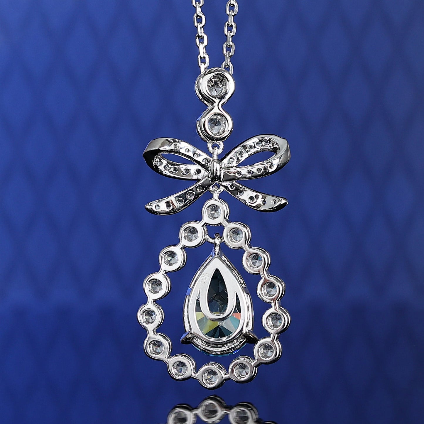 Micro-setting Aquamarine color Lab created stones Santa Maria Stars necklace, sterling silver.
