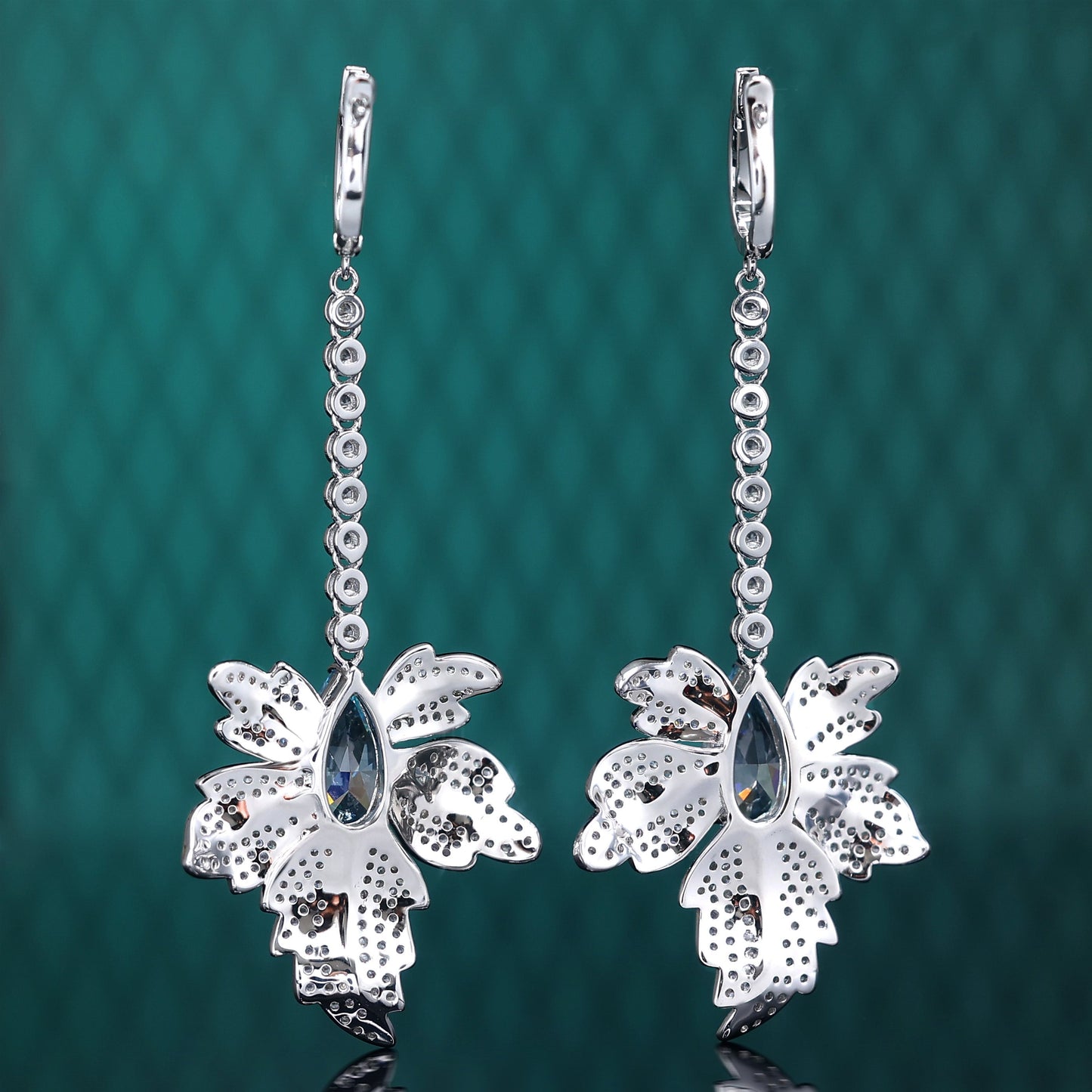 Micro-setting Aquamarine color Lab created stones Maple Leaf earrings, sterling silver.
