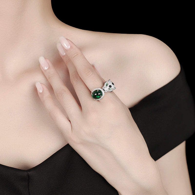 Jaguar selection, featuring stunning artificial emerald and Diamonds color Lab created stones open ring. sterling silver