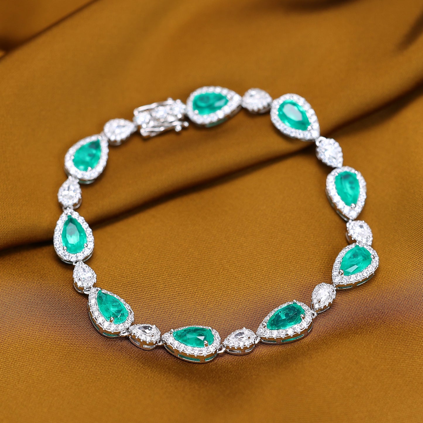 Micro-setting Emerald color Lab created stones fully studded waterdrop bracelet, sterling silver