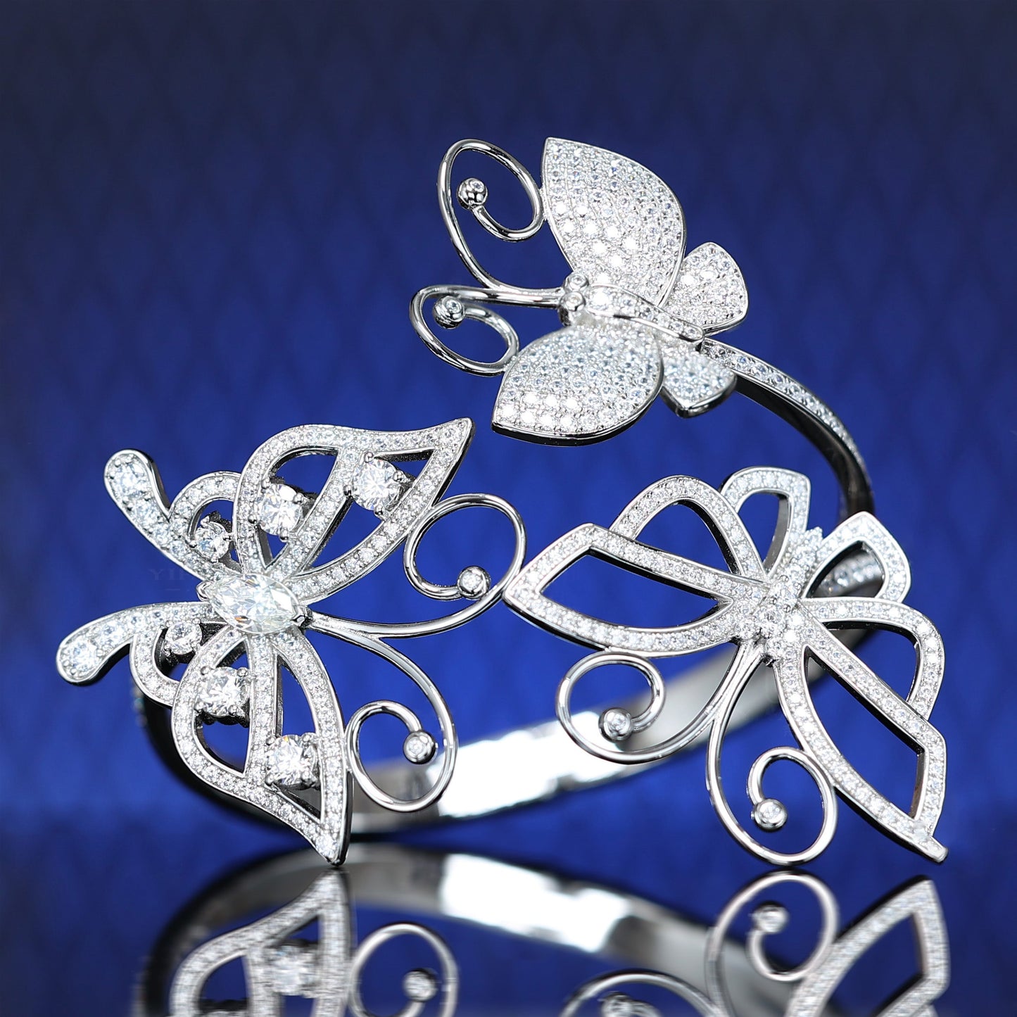 Micro-setting butterflies Lab created stones rise and dance bangle, sterling silver.