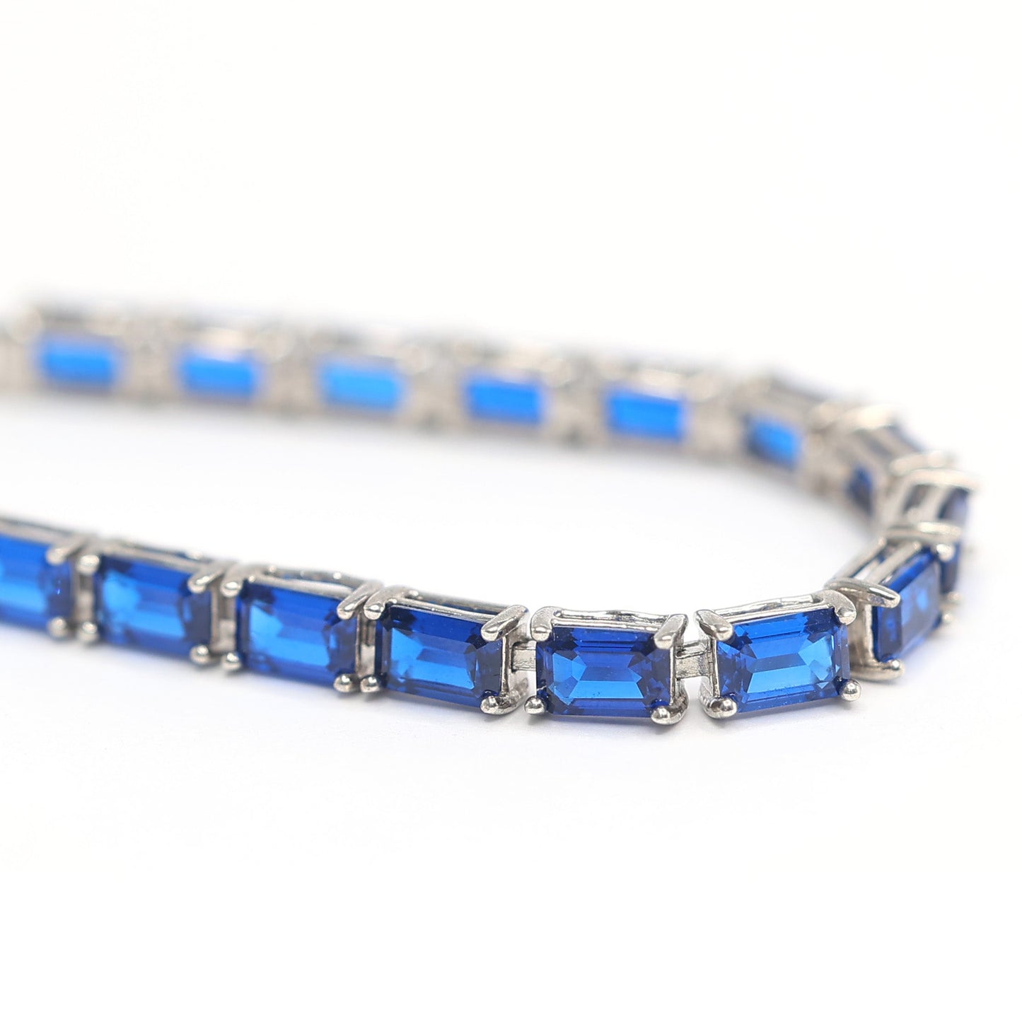 Micro-setting Sapphire color emerald cut Lab created stones fully studded bracelet, sterling silver