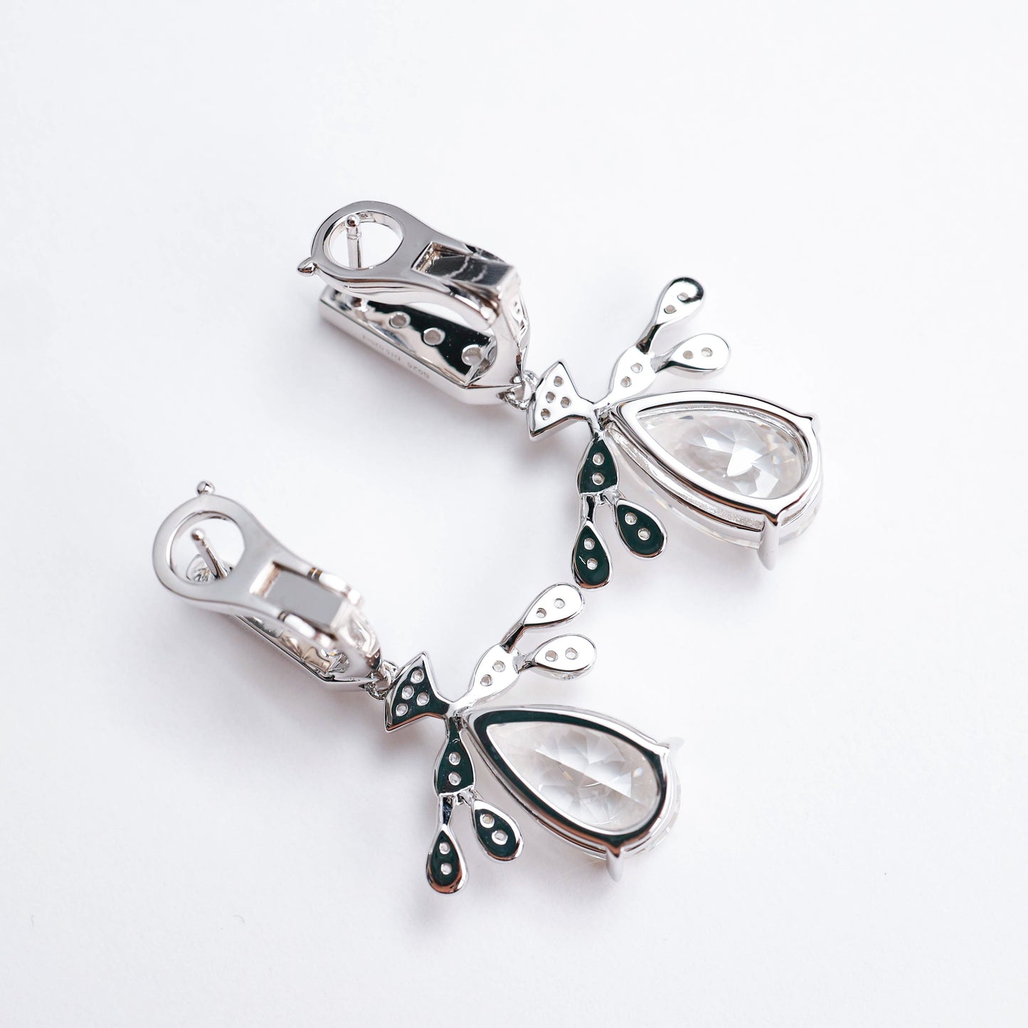 Micro-setting diamond color Lab created stones Angel's Wings earrings. sterling silver.