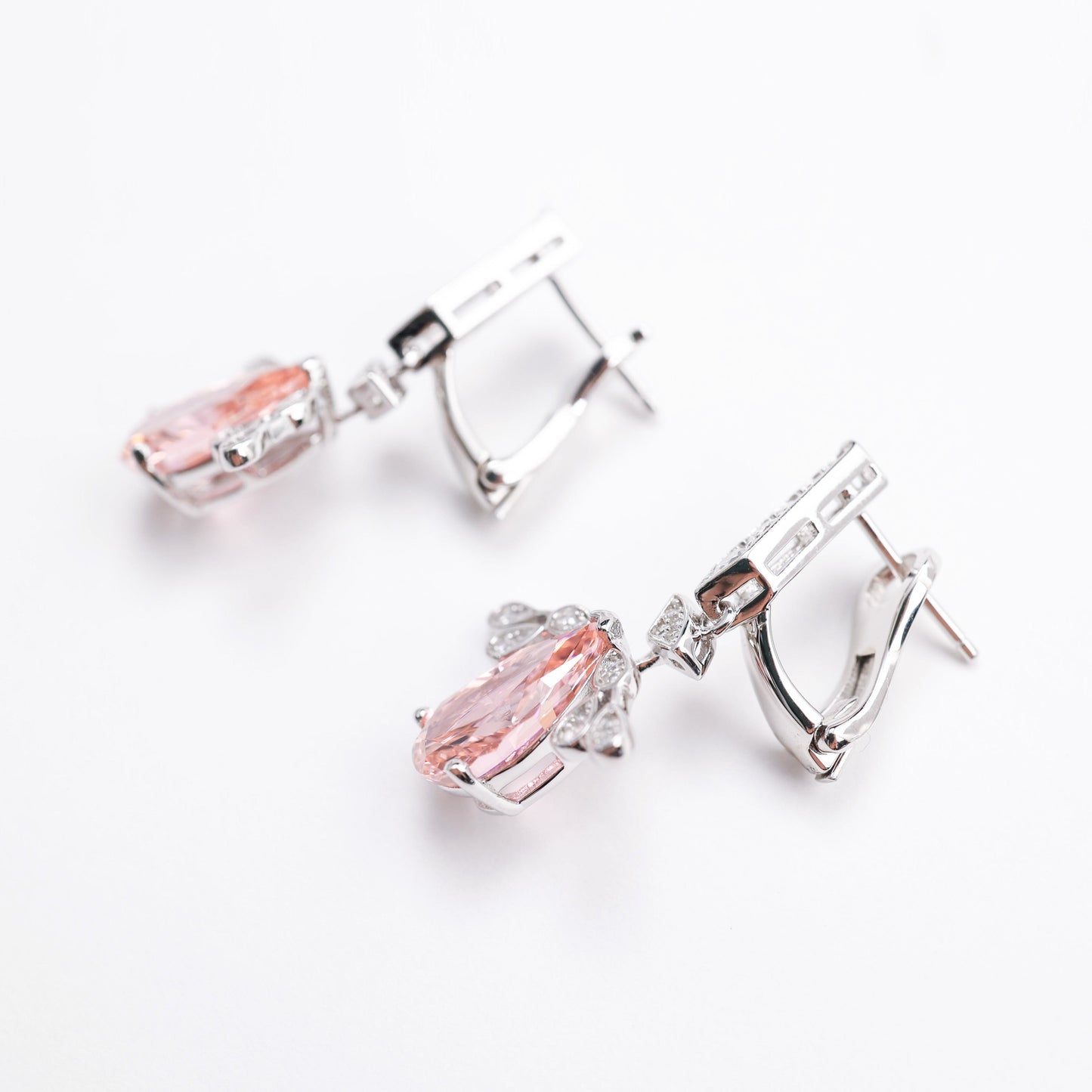 Micro-setting Morganite color Lab created stones Angel's Wings earrings. sterling silver.