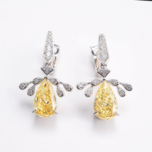 Micro-setting Yellow diamond color Lab created stones Angel's Wings earrings. sterling silver.