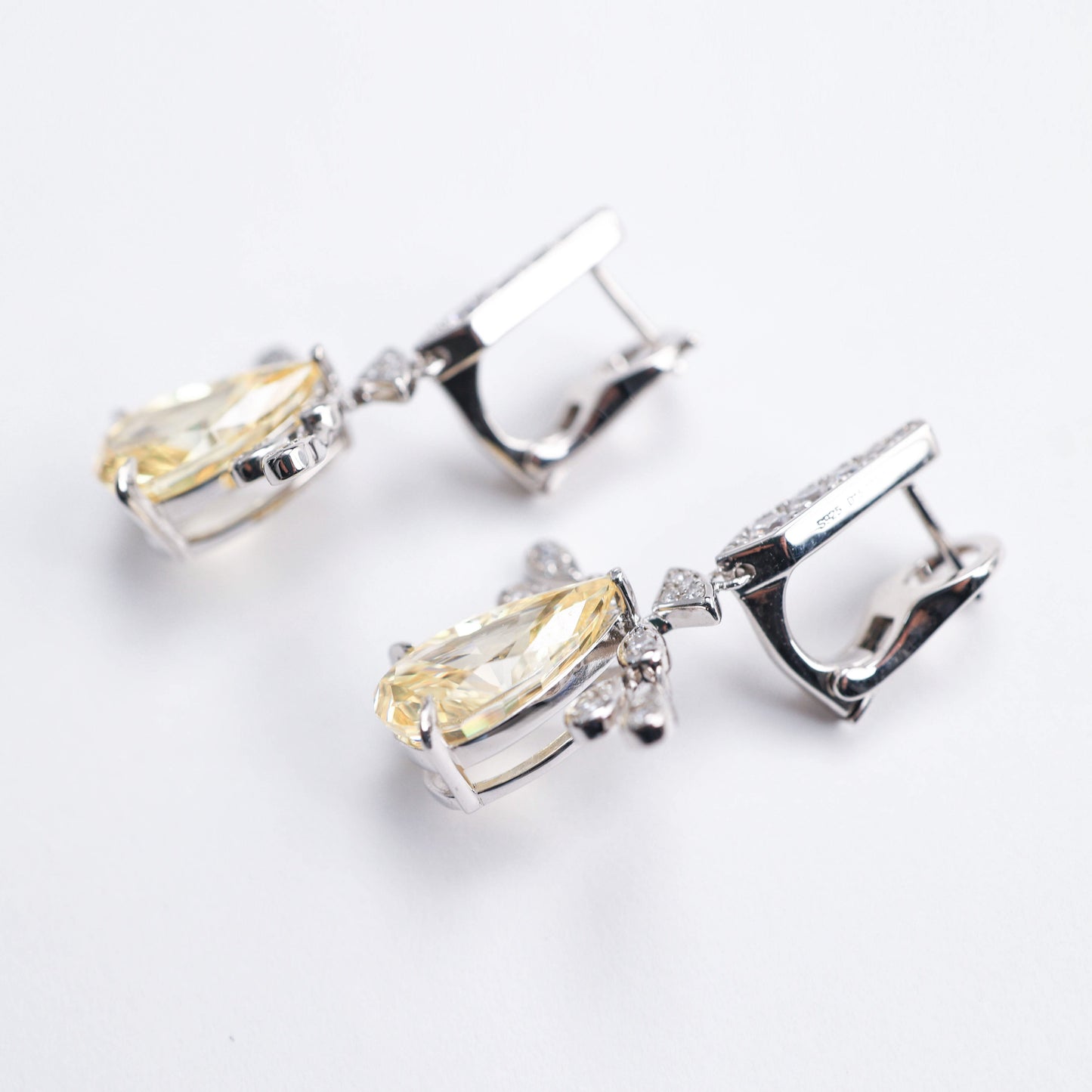 Micro-setting Yellow diamond color Lab created stones Angel's Wings earrings. sterling silver.