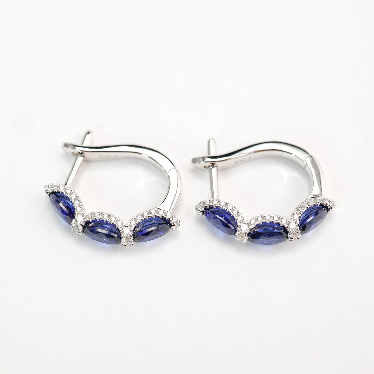 Micro-setting Sapphire color Lab created stones ear loop, sterling silver