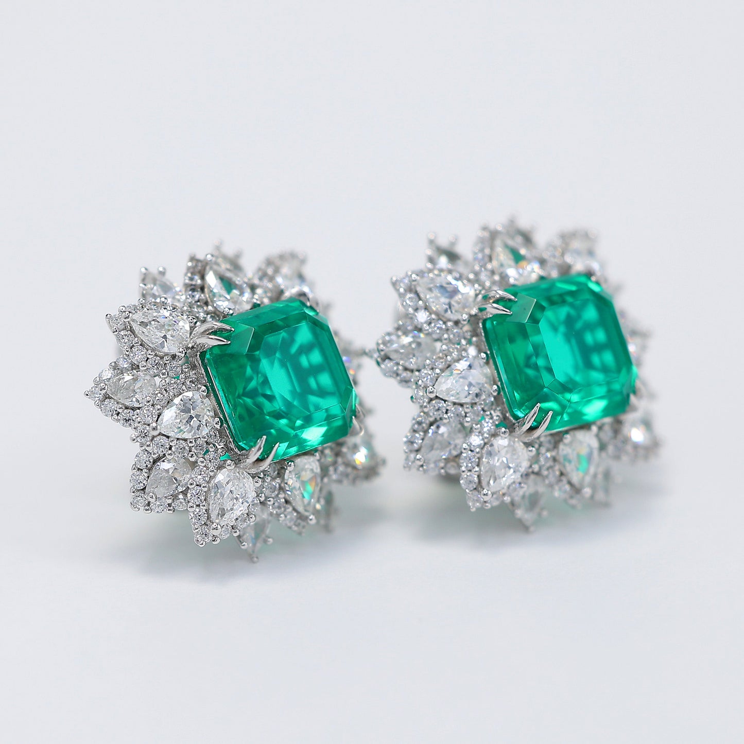 Micro-setting emerald color Lab created stones fancy square shape fully studded earrings, sterling silver