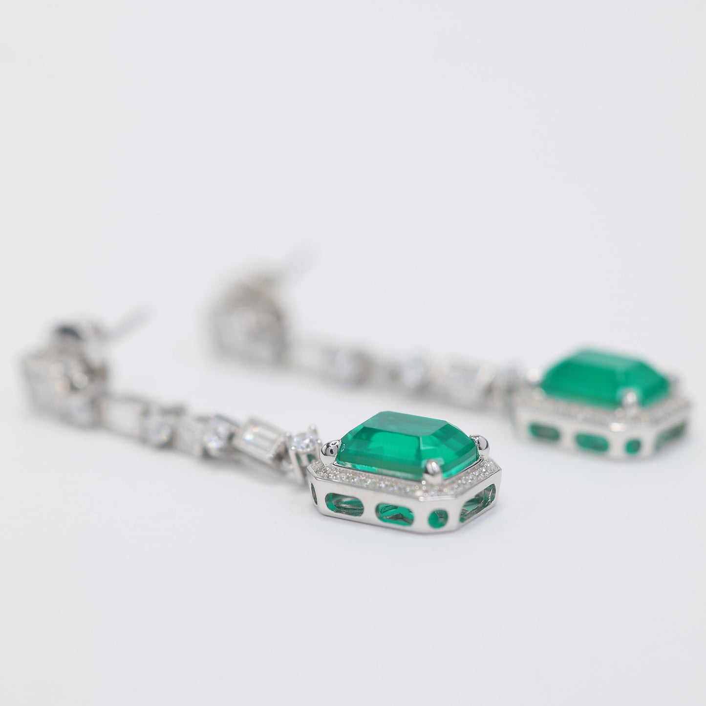 Micro-setting rectangular shape emerald color Lab created stones 4 prong earrings, sterling silver