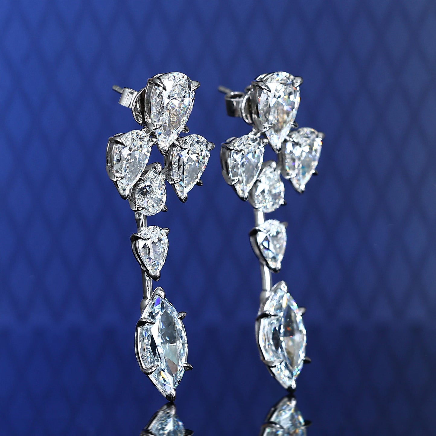 Micro-setting very light intense blue diamond color lab created stones The light of blue flame earrings, sterling silver.