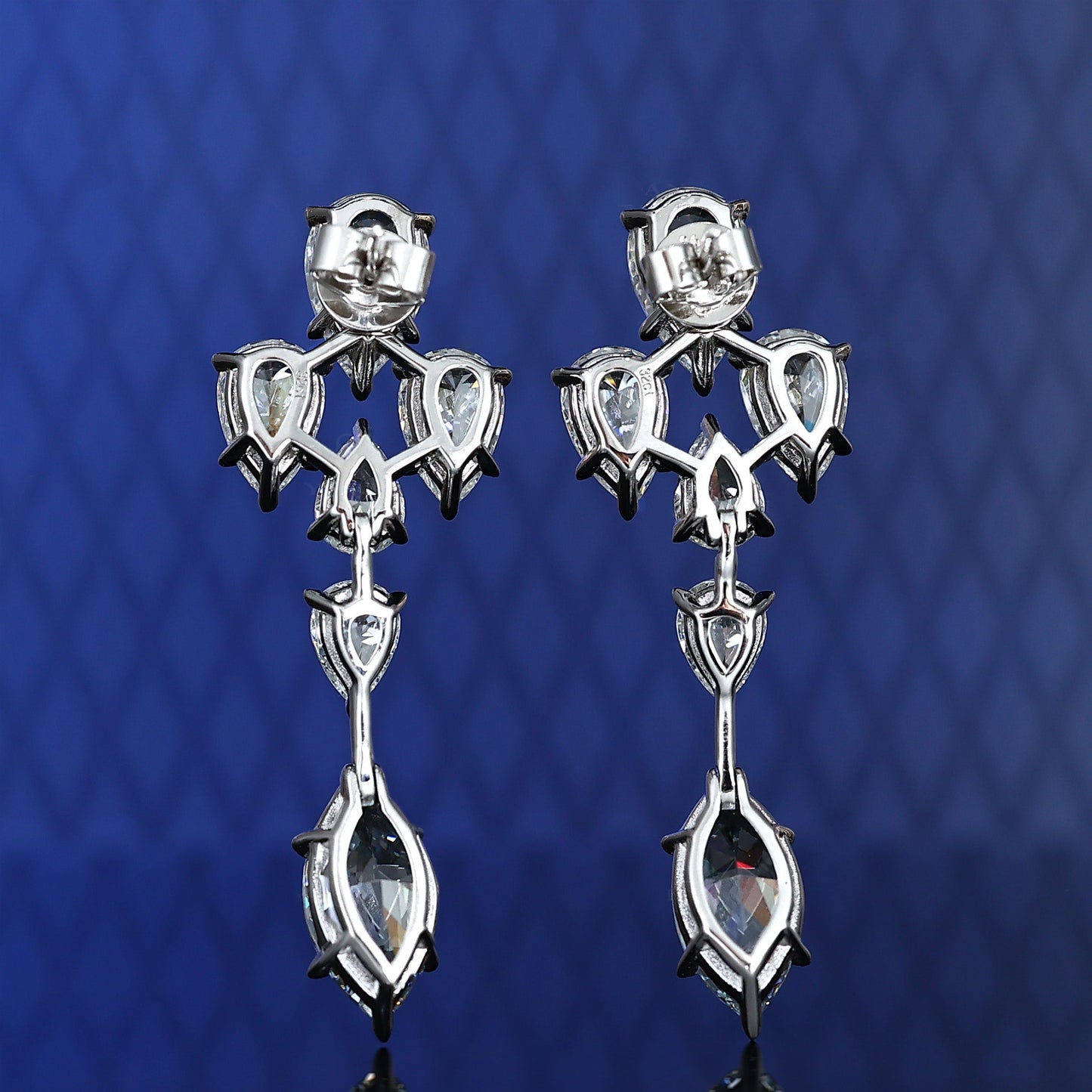 Micro-setting very light intense blue diamond color lab created stones The light of blue flame earrings, sterling silver.